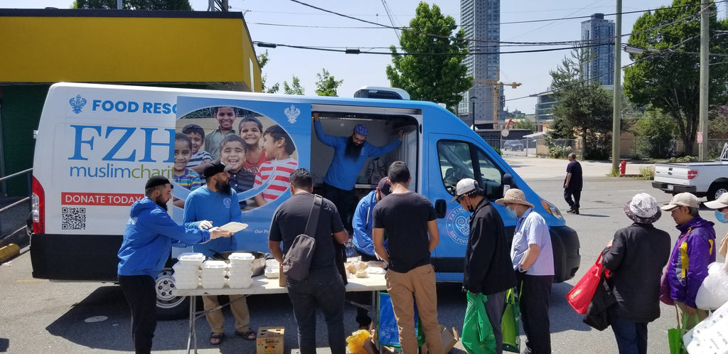 Vancouver, Canada - Participating in Mobile Food Rescue Program by Serving Hot Meals & Snacks & Distributing Essential Groceries to Local Community's Less Privileged People