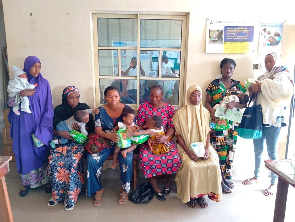 Abuja, Nigeria - Participating in Pediatric Medical Outreach Program by Distributing Anti-Malaria and Anti-Typhoid Medications to 228+ Less Privileged Children & Free Diapers to 200+ Babies & Nursing Mothers at Local Health Centers