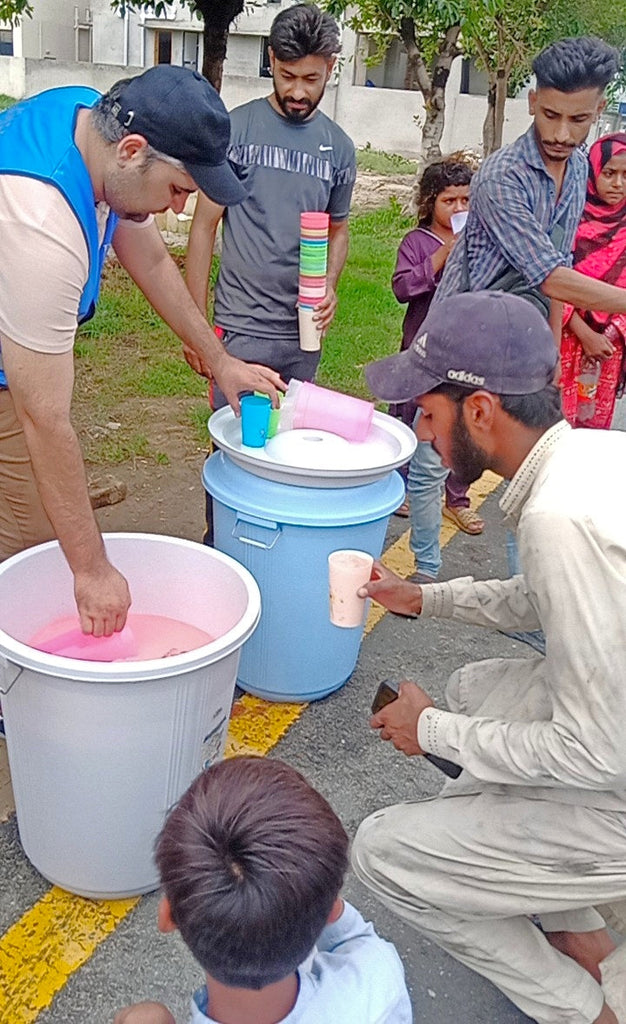 Lahore, Pakistan - Muharram Day 3 - Participating in Our Mobile Food Rescue Program by Serving 60+ Chilled Drinks on Hot Summer Days to Less Privileged People