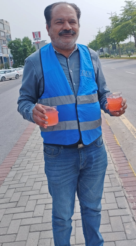 Lahore, Pakistan - Participating in Our Mobile Food Rescue Program by Serving 60+ Chilled Drinks on Hot Summer Days to Less Privileged People