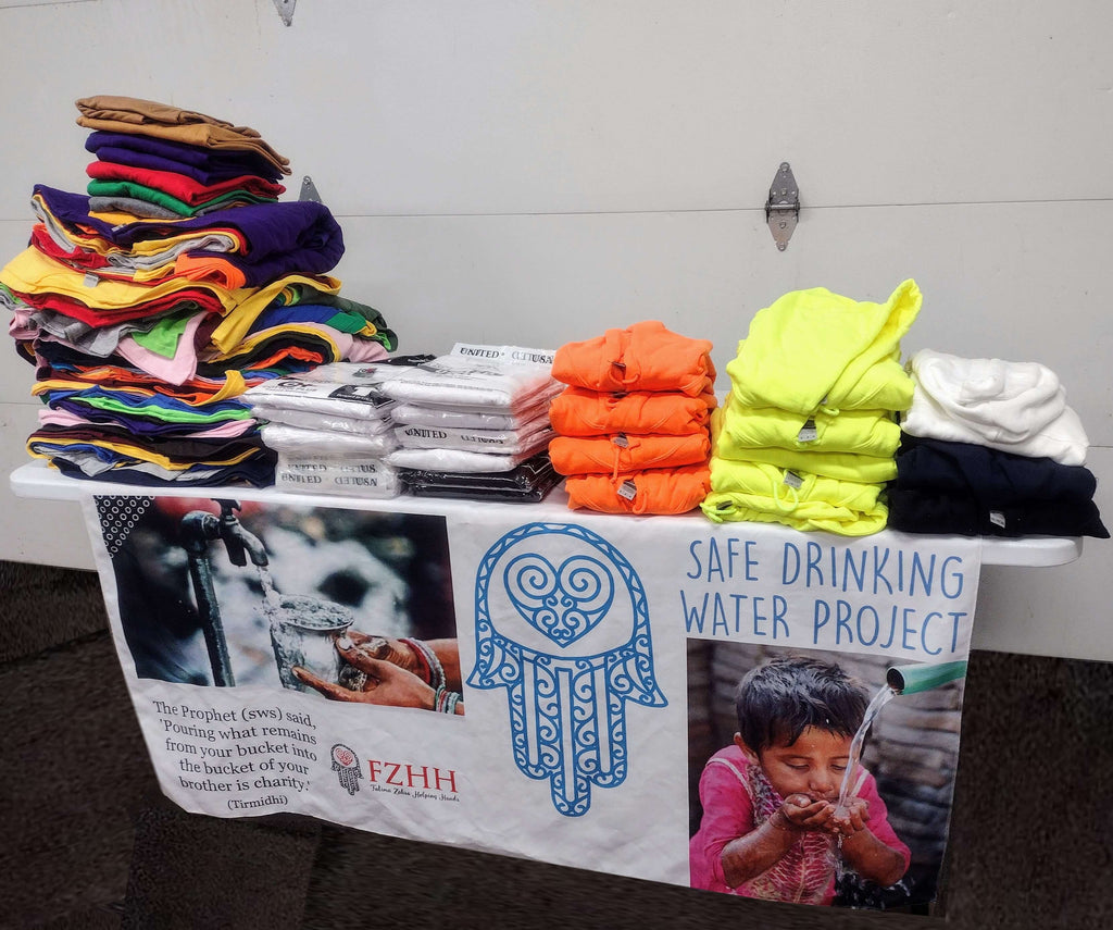 FZHH Mobile Relief Van Picking Up Donated Apparel & Accessories for Community's Homeless Shelter Needs – CHI