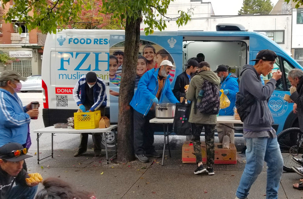 Vancouver, Canada - Participating in Mobile Food Rescue Program by Serving Hot Breakfasts & Lunches with Drinks & Desserts & Distributing Rescued Essential Foods to Local Community's Less Privileged People