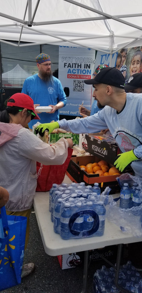 Vancouver, Canada - Participating in Mobile Food Rescue Program by Serving Hot Meals and Snacks & Distributing Essential Groceries to Local Community's Less Privileged People