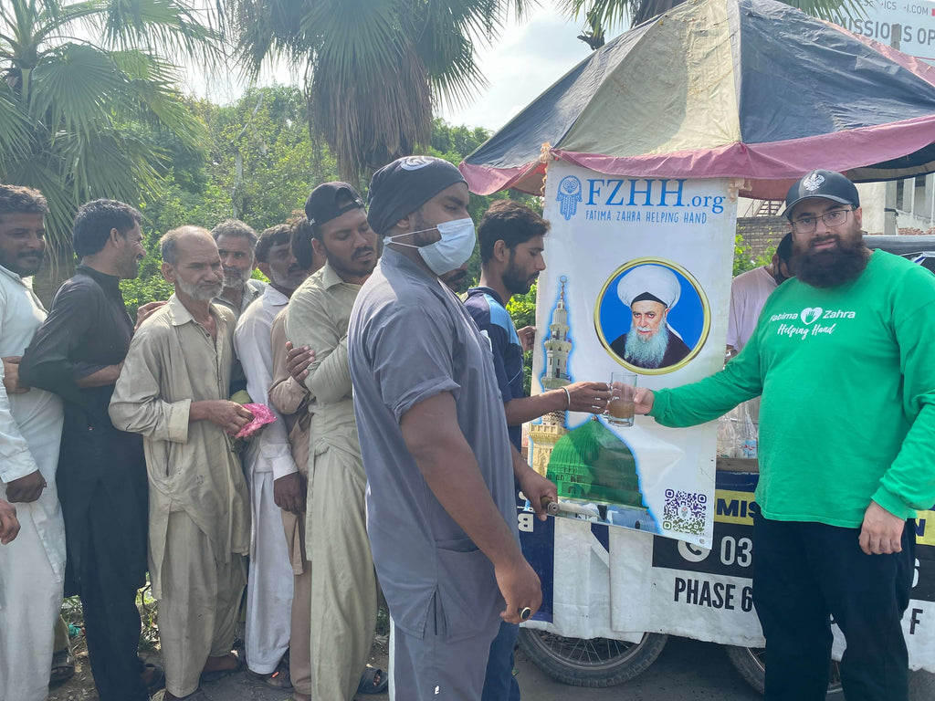 Distributing Holy Zam Zam to Honor Birthday of Mawlana Shah Naqshband (Q) – PK