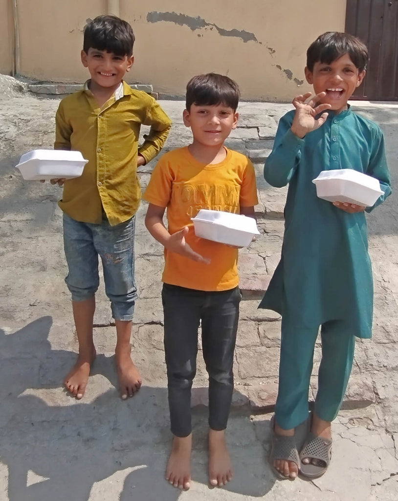 Lahore, Pakistan - Participating in Mobile Food Rescue Program by Distributing Freshly Made Sweet Rice to 100+ Less Privileged Children, Women & Men