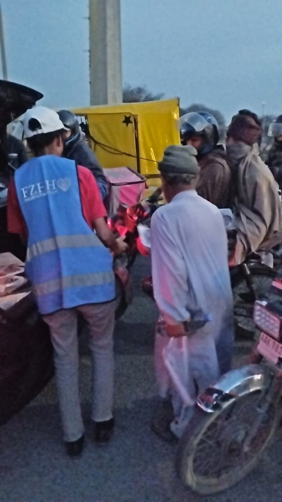Lahore, Pakistan - Participating in Holy Qurbani Program & Mobile Food Rescue Program by Processing, Packaging & Distributing Holy Qurbani Meat from Holy Qurban to Local Community's Less Privileged Families