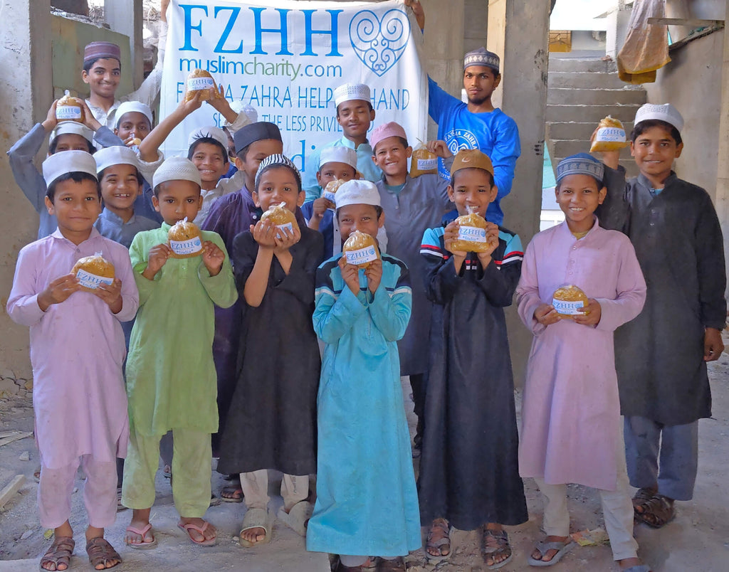 Hyderabad, India - Participating in Mobile Food Rescue Program by Distributing Hot Meals to Madrasa Students, Homeless & Less Privileged Families