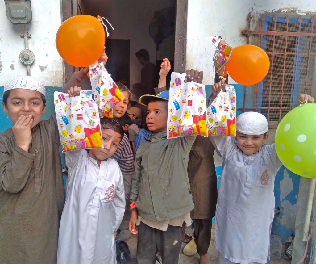 Karachi, Pakistan - Participating in Mobile Food Rescue Program by Serving Hot Meals & Distributing Goodie Bags Filled with Snacks & Candies to 150+ Beloved Orphans & Less Privileged Children at Local Community's Orphanage