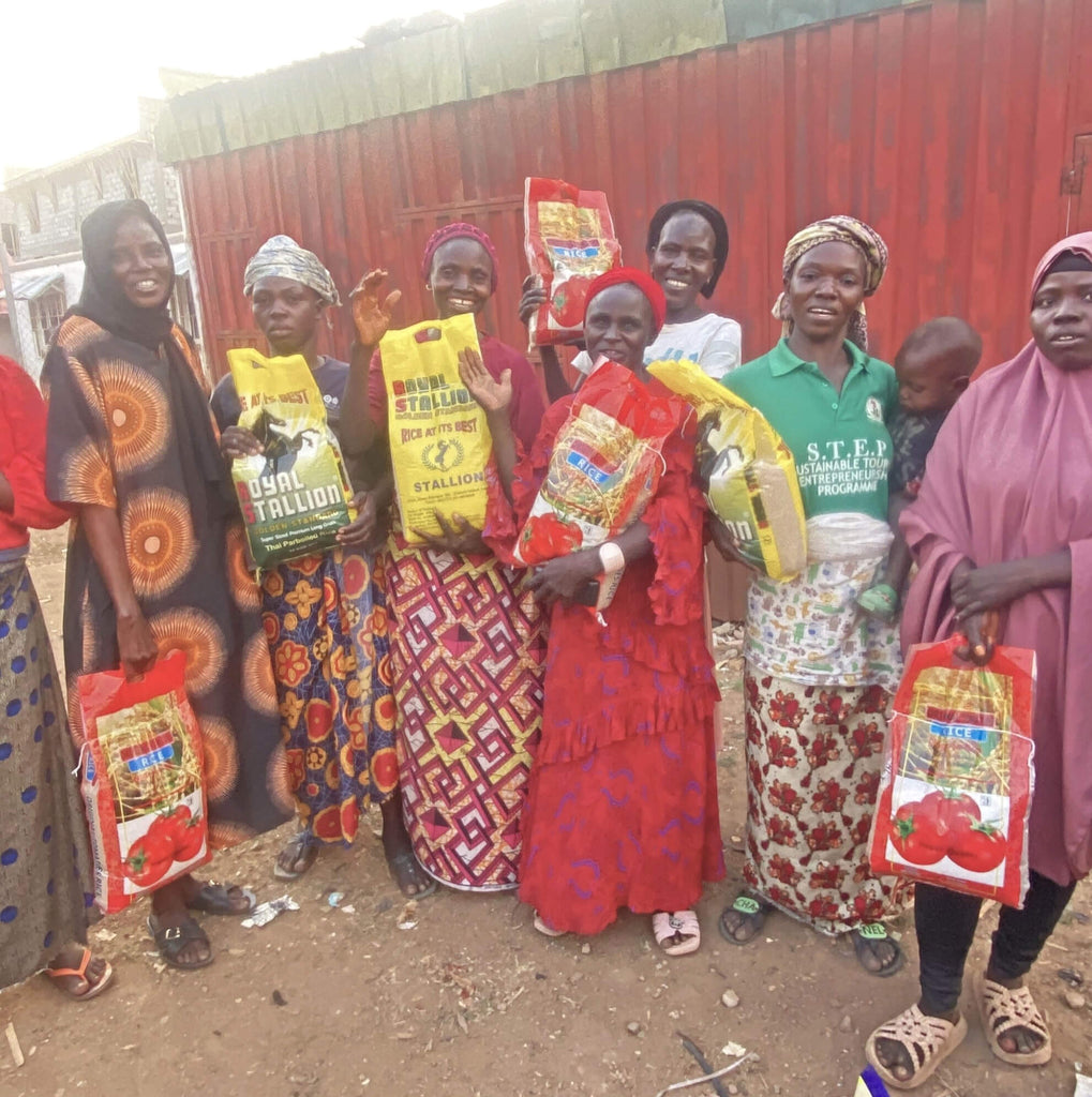 Abuja, Nigeria - Participating in Mobile Food Rescue Program by Distributing 14+ Rice Bags, 10+ Footwear & 100+ Candies to Less Privileged Children & Women