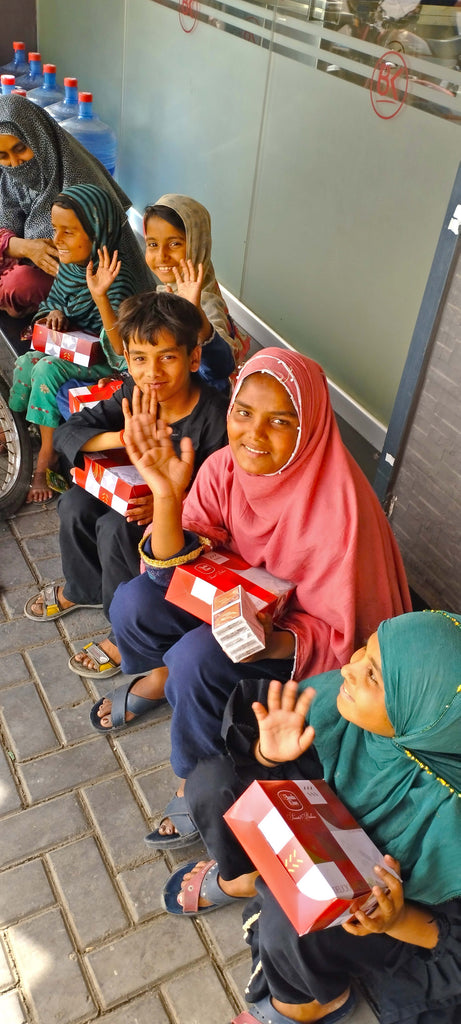 Lahore, Pakistan - Participating in Our Mobile Food Rescue Program by Distributing 40+ Hot Lunch Boxes with Chips, Juices & Chocolates to Less Privileged Hafiz-e-Quran Students & Homeless Children
