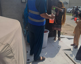 Lahore, Pakistan - Participating in Mobile Food Rescue Program by Distributing Hot Meals & Rose Water to 60+ Less Privileged People
