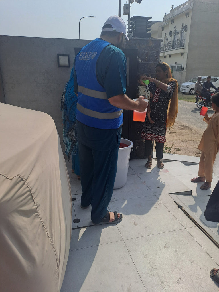 Lahore, Pakistan - Participating in Mobile Food Rescue Program by Distributing Hot Meals & Rose Water to 60+ Less Privileged People
