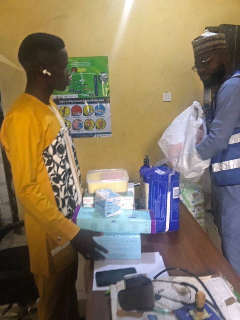 Abuja, Nigeria - Participating in Pediatric Medical Outreach Program by Distributing Essential Pediatric Consumable Supplies & Anti-Malaria and Anti-Typhoid Medications to 500+ Less Privileged Children & Nursing Mothers at Local Health Center