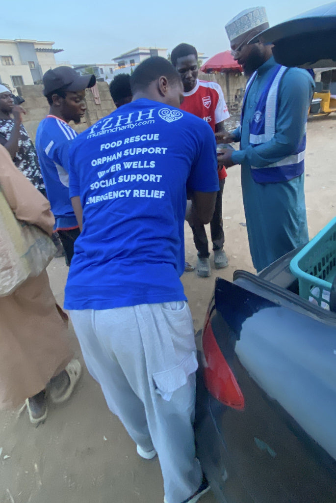 Abuja, Nigeria - Participating in our Mobile Food Rescue Program by Preparing, Packaging & Distributing Hot Homemade Meals & Water Bottles to 40+ Less Privileged People
