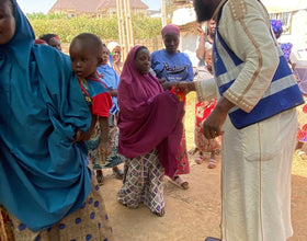 Abuja, Nigeria - Participating in Mobile Food Rescue Program by Distributing 13+ Rice Bags to Disabled Families & Lots of Candies to Less Privileged Children at Local Community's Internally Displaced Camp