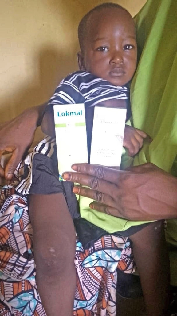 Abuja, Nigeria - Participating in Pediatric Medical Outreach Program by Treating 500+ Sick Children & Distributing Essential Abti-Malaria and Anti-Typhoid Medicines to Less Privileged Children & Nursing Mothers at Local Health Centers
