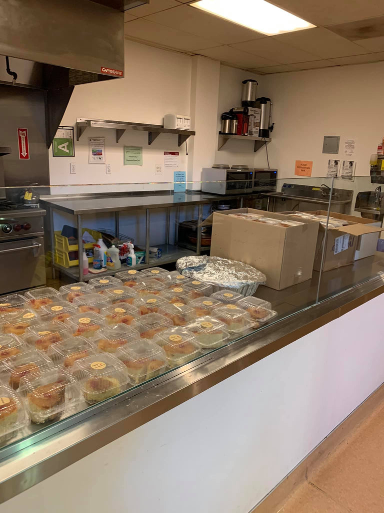 Mobile Relief Distributing Warm Meals to Homeless Shelter - LA