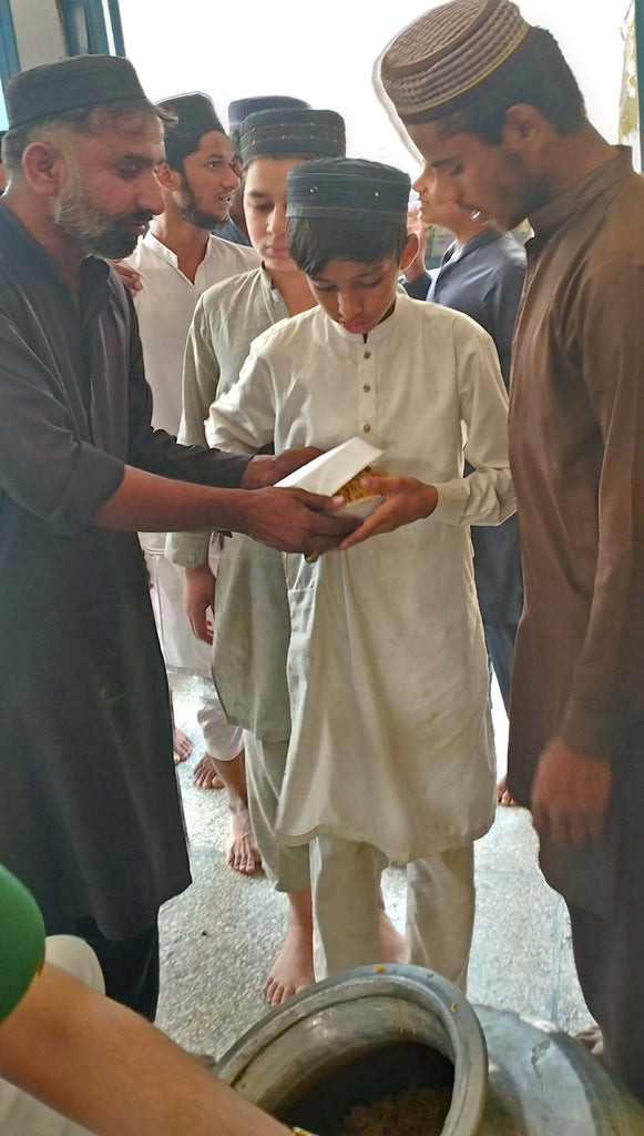 Lahore, Pakistan - Participating in Our Mobile Food Rescue Program by Preparing, Packaging & Distributing Hot Biryani Meals to 150+ Less Privileged Hafiz-e-Quran Students, Homeless Children & Adults
