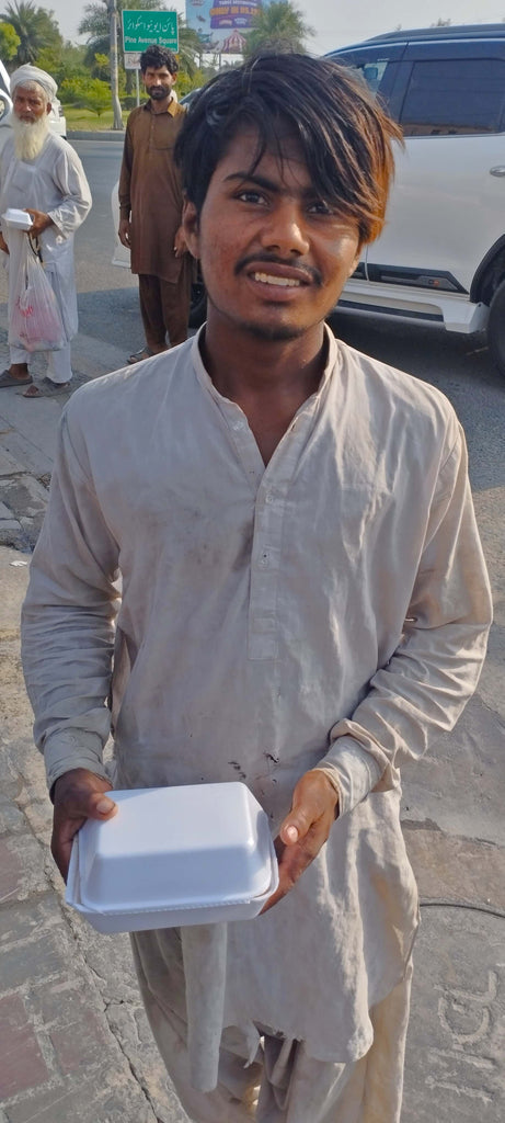 Lahore, Pakistan - Participating in Mobile Food Rescue Program by Distributing Hot Meals (Chicken Biryani) to 40+ Less Privileged Children & Adults