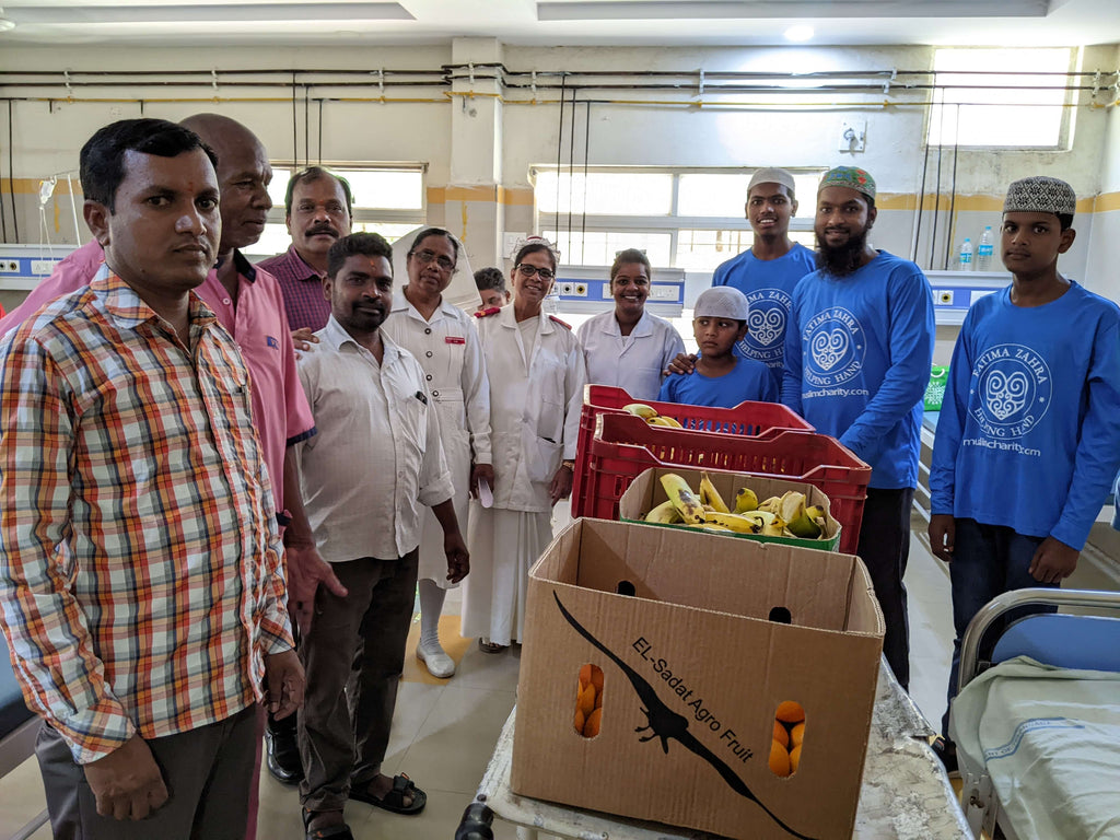 Hyderabad, India - Participating in Mobile Food Rescue Program by Distributing Fresh Fruits to 100+ Patients & Attendees at Local Community's District Hospital Serving Less Privileged People