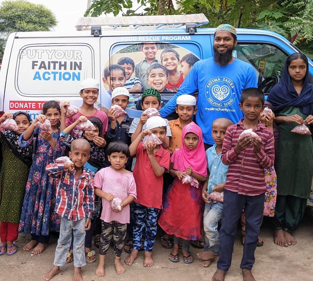 Hyderabad, India - Participating in Mobile Food Rescue Program by Distributing Fresh Boneless Meat Packets to Local Community's Homeless & Less Privileged Families