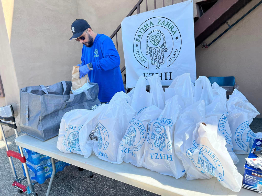 Los Angeles, California - Honoring URS/Union Sharif of Sultan al Awliya Fard Alam Shahe Kul Mawlana Shaykh Shah Bahauddin Naqshband Uwaisi al Bukhari ق ع Hasani wal Husseini by Serving Hot Lunches & Distributing Rescued Groceries to Low-Income Residents