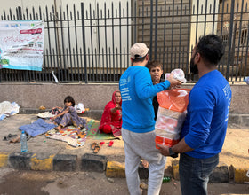 Karachi, Pakistan - Participating in Our Mobile Food Rescue Program by Preparing, Packaging, Serving & Distributing Hot Meals & Cold Drinks to 150+ Less Privileged Children, Women & Men